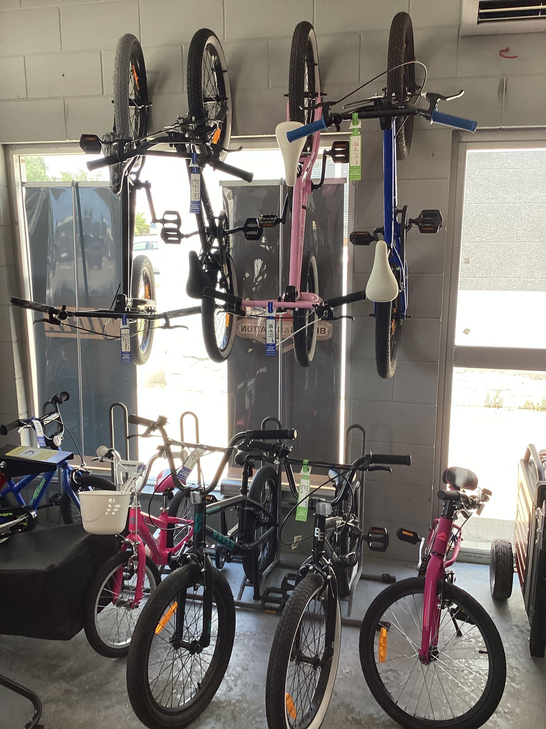 Two Boys Cycling with Backpacks On — Push Bikes In Bowen, QLD