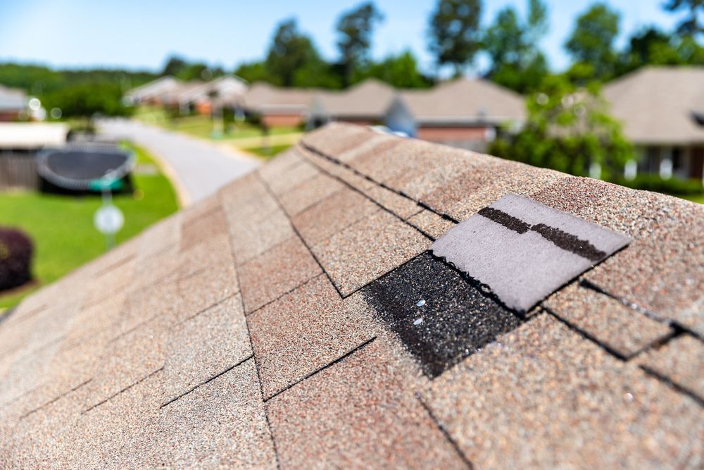 A close up of a roof with a hole in it.