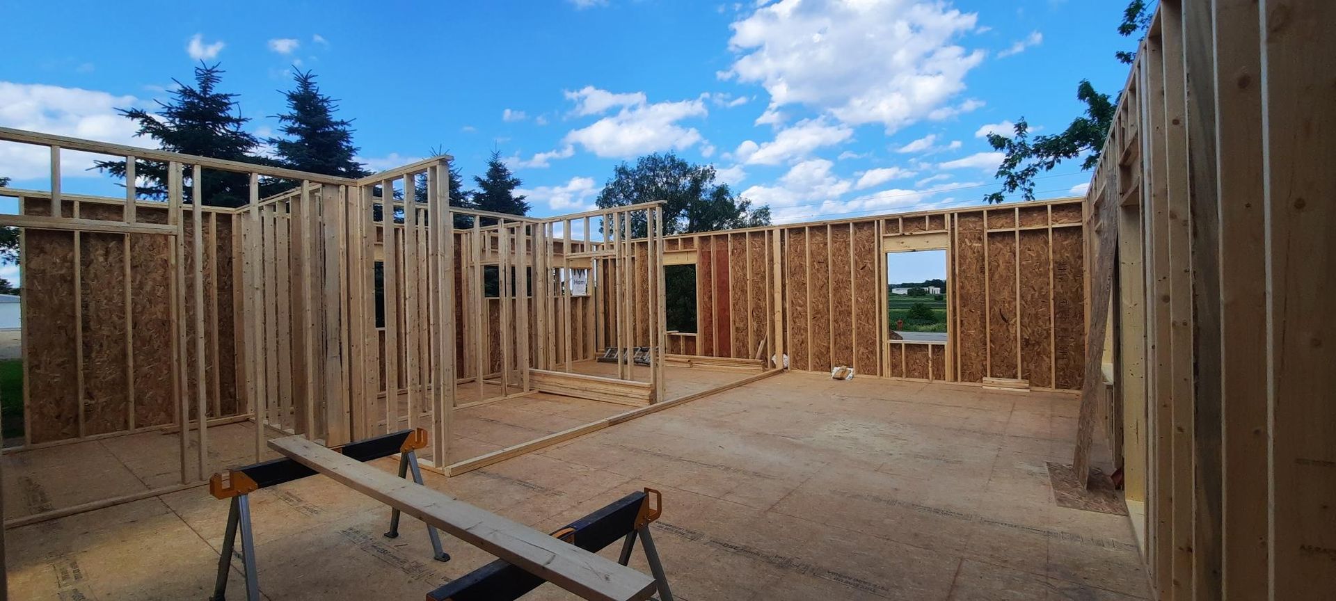 A house is being built with a lot of wood.