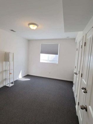 There is a window in the middle of the room.