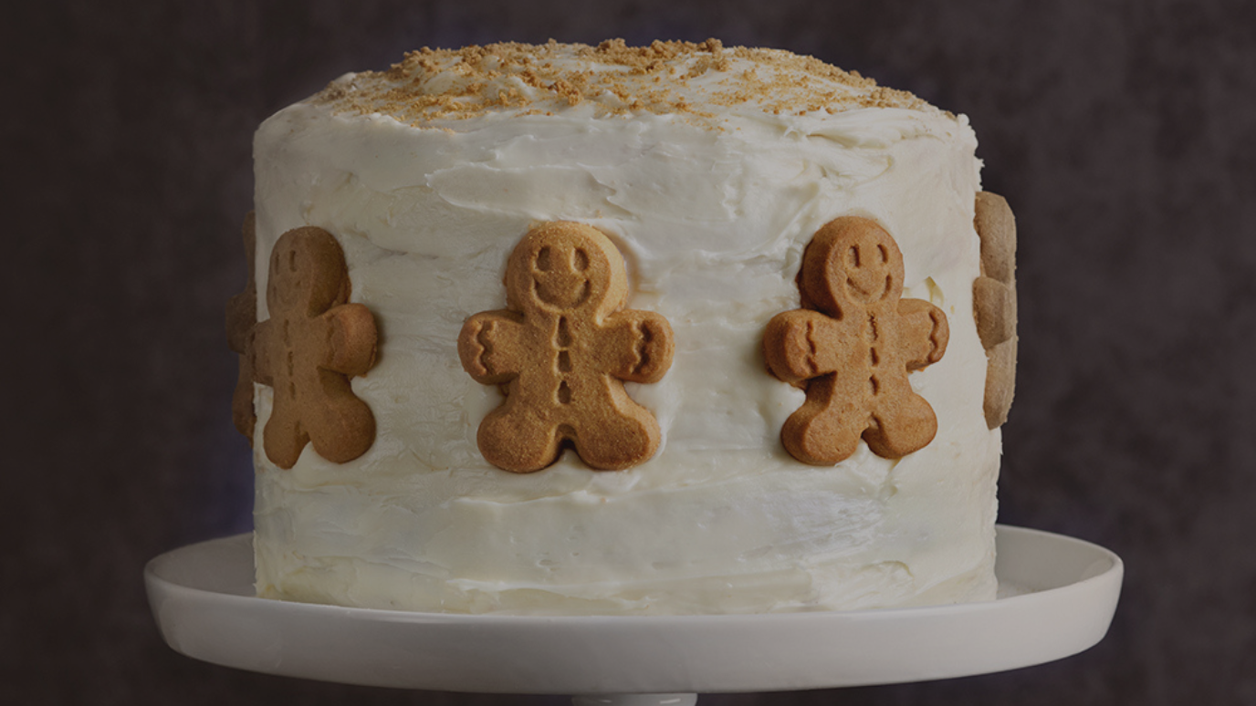 Cake with gingerbread men on side