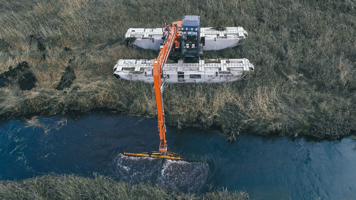 Remu working on small river path | Perth, WA | DM Breaker Equipment