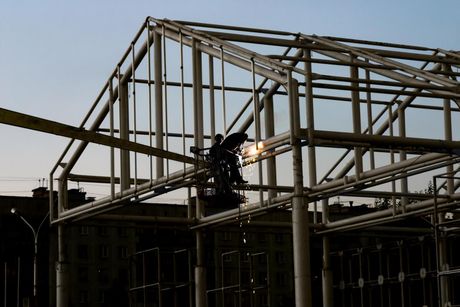 contractor building a roof