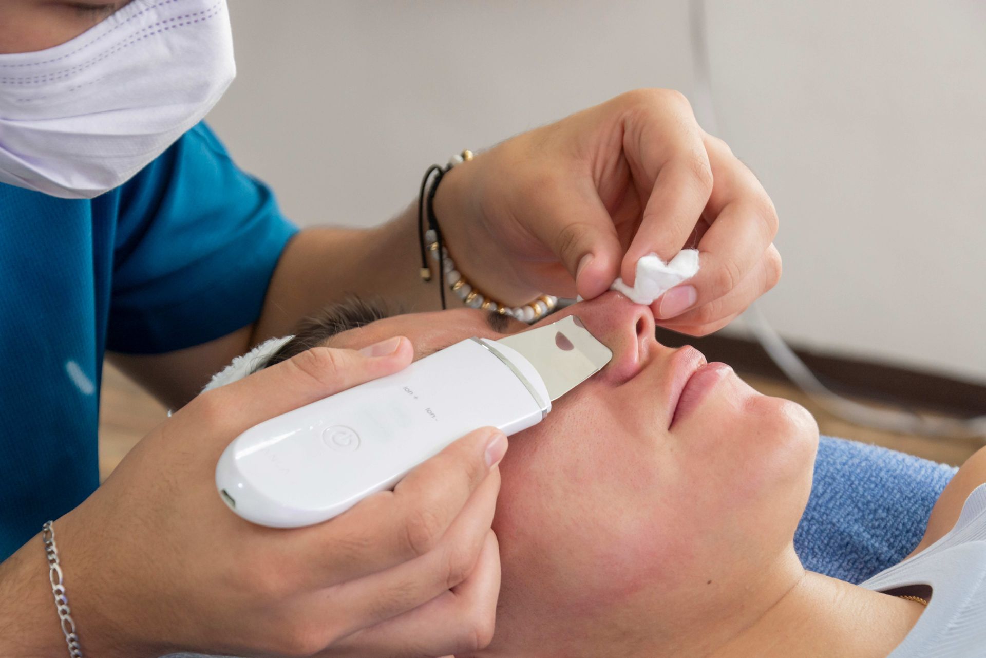 Woman's Face With an Ultrasonic Spatula — Morganville, NJ — Bombshell Aesthetic Medical Spa Woman's Face With an Ultrasonic Spatula — Morganville, NJ — Bombshell Aesthetic Medical Spa