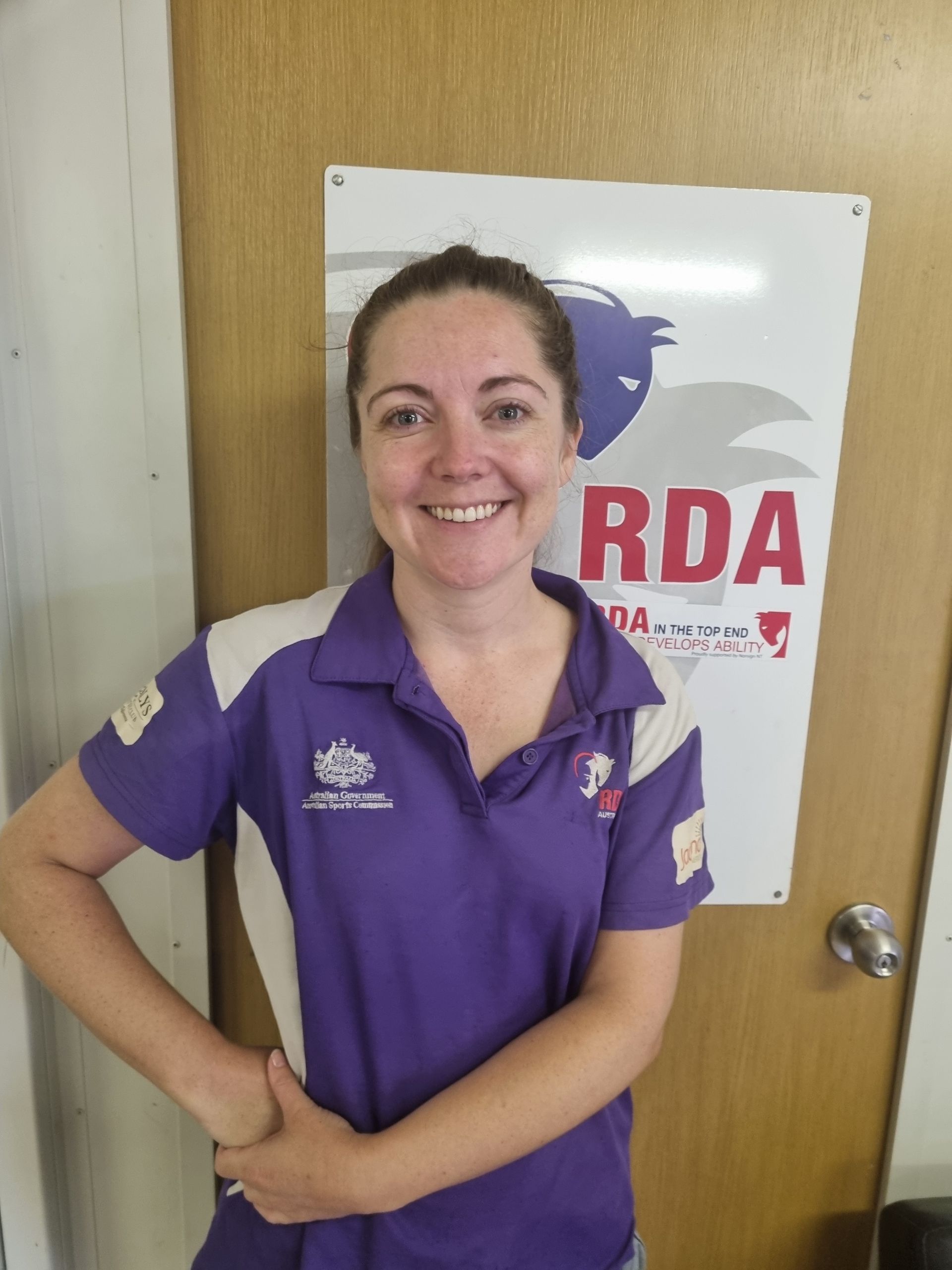 The logo for riding for the disabled association top end inc.