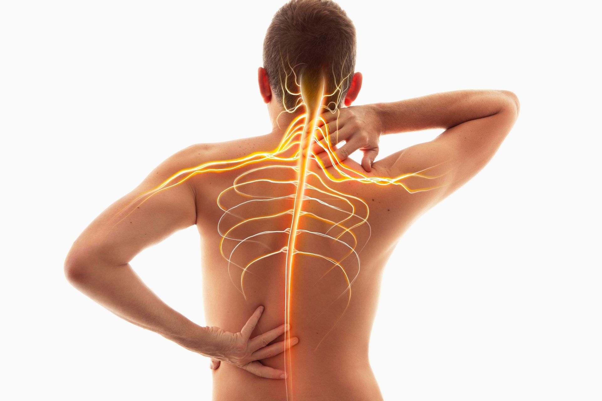 A man is holding his back in pain because of a muscle strain.