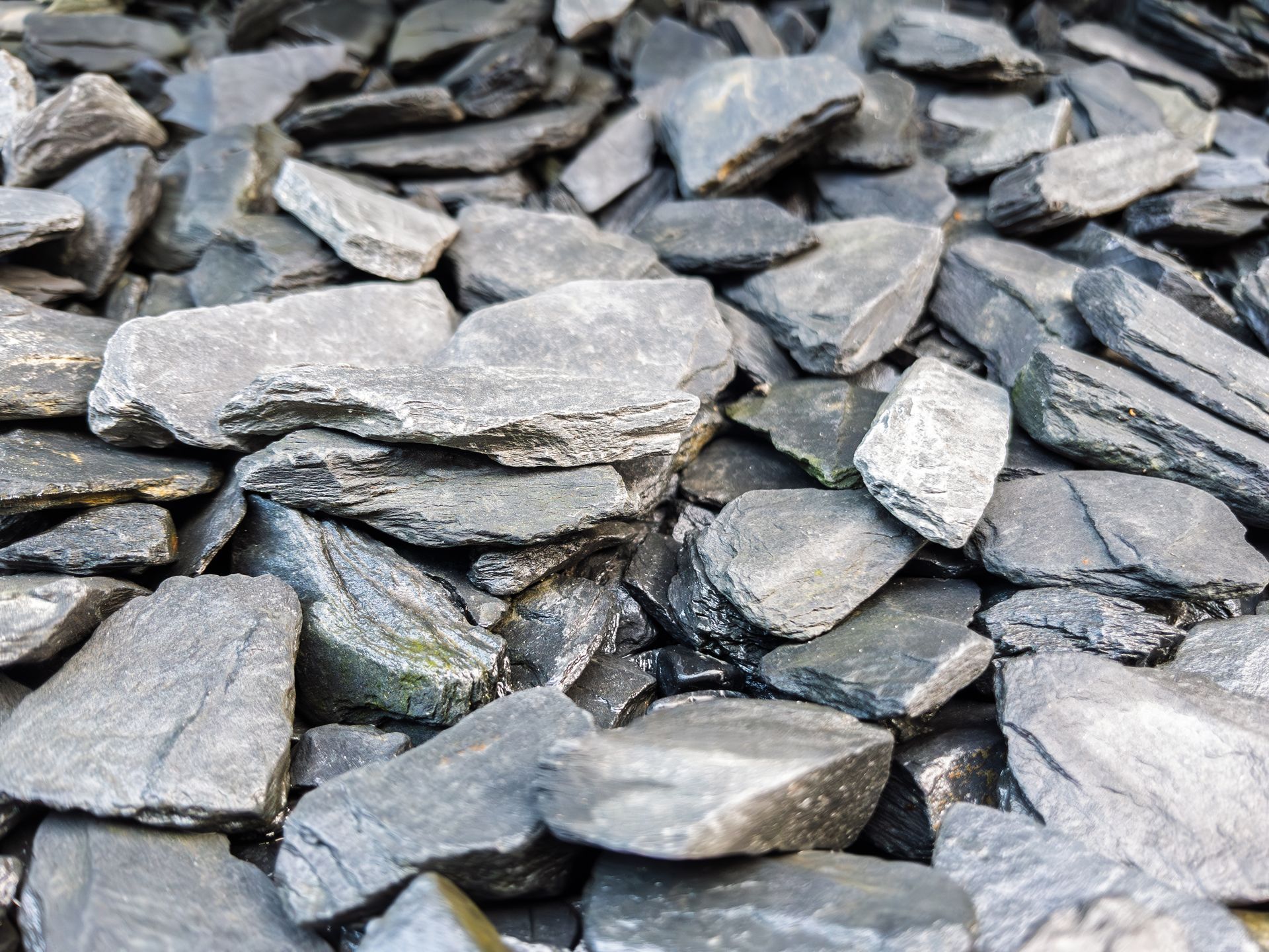 Decorative slate pieces for landscape edging accents. Decorative slate pieces for landscape edging accents.