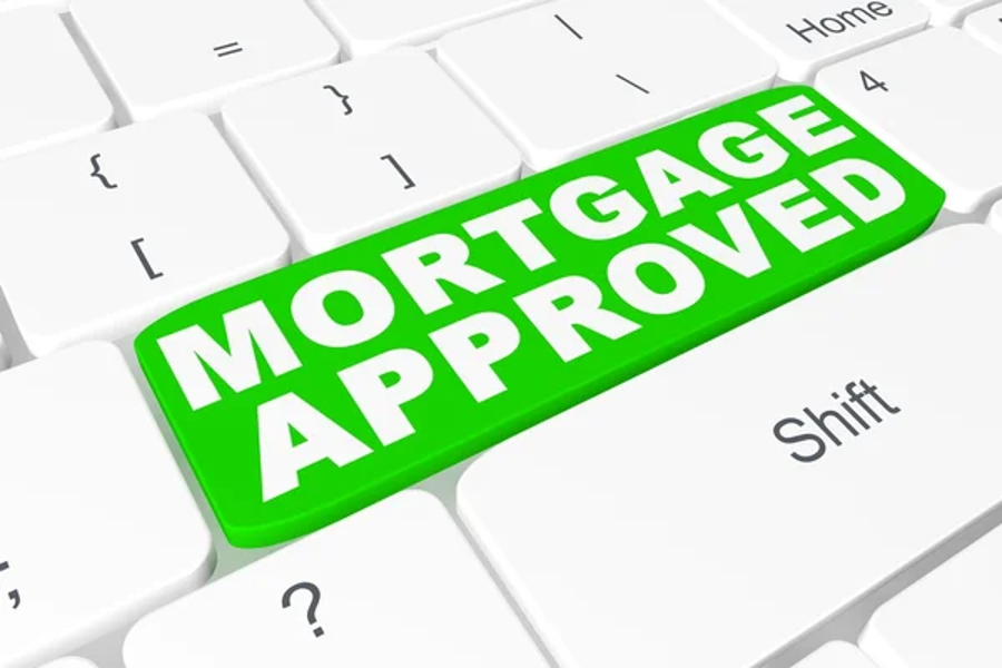 A Person Is Pressing a Business Loan Button on A Keyboard — Marks Financial Group in  Toowoomba City, QLD