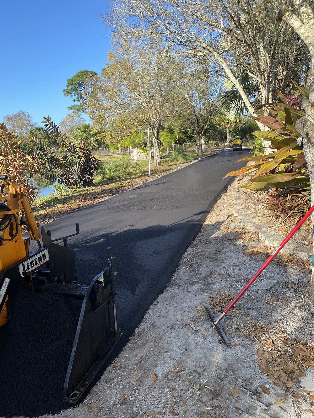 Roller Compacting Asphalt on a Road | Glen Mills, PA | Isaac’s Asphalt Construction LLC
