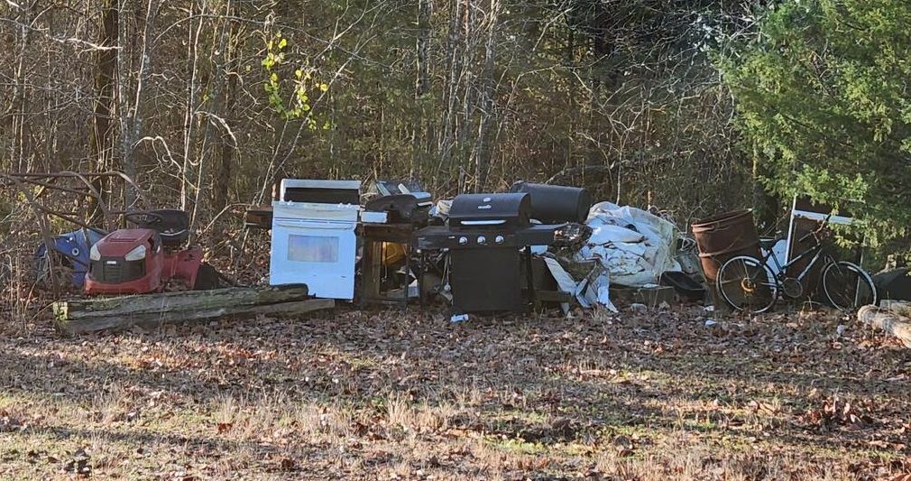 stove and bbq in yard, appliance removal and recycling, titan junk removal