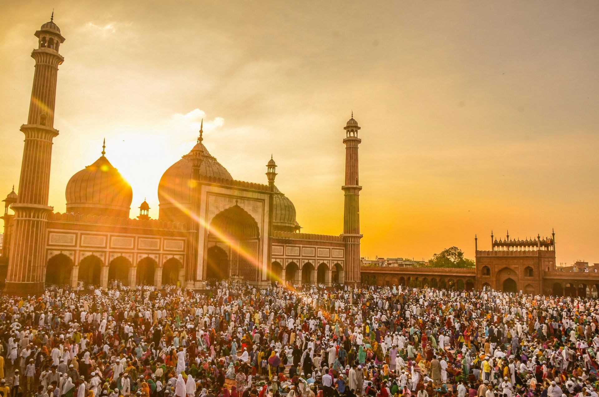 An image of a mosque with many people