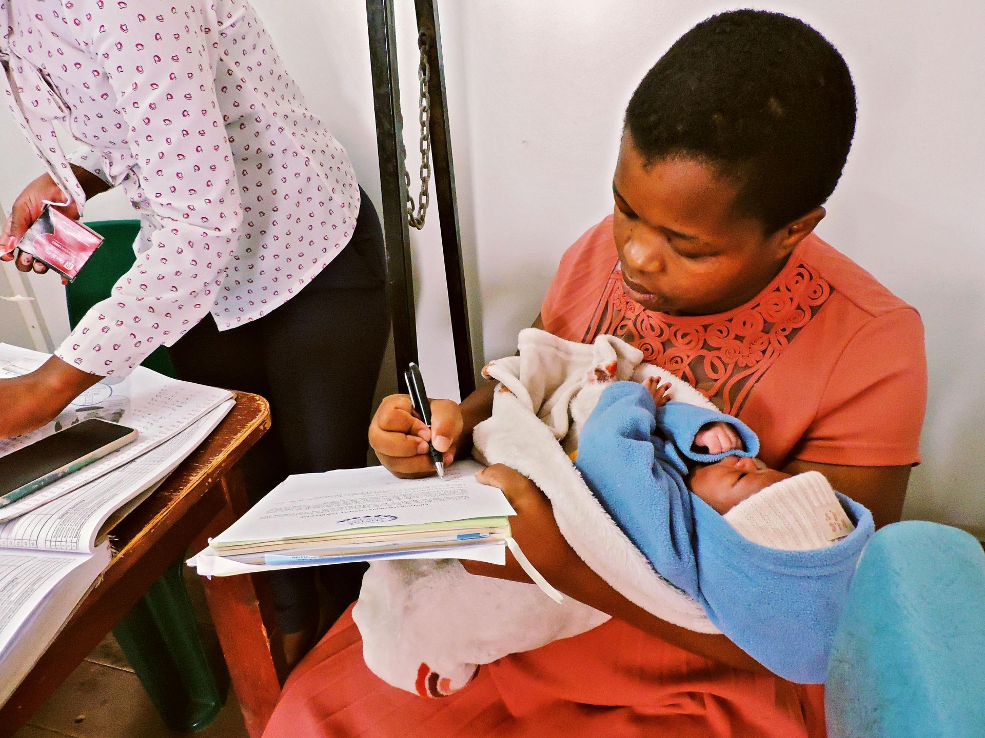 a mother and baby at a medical appointment