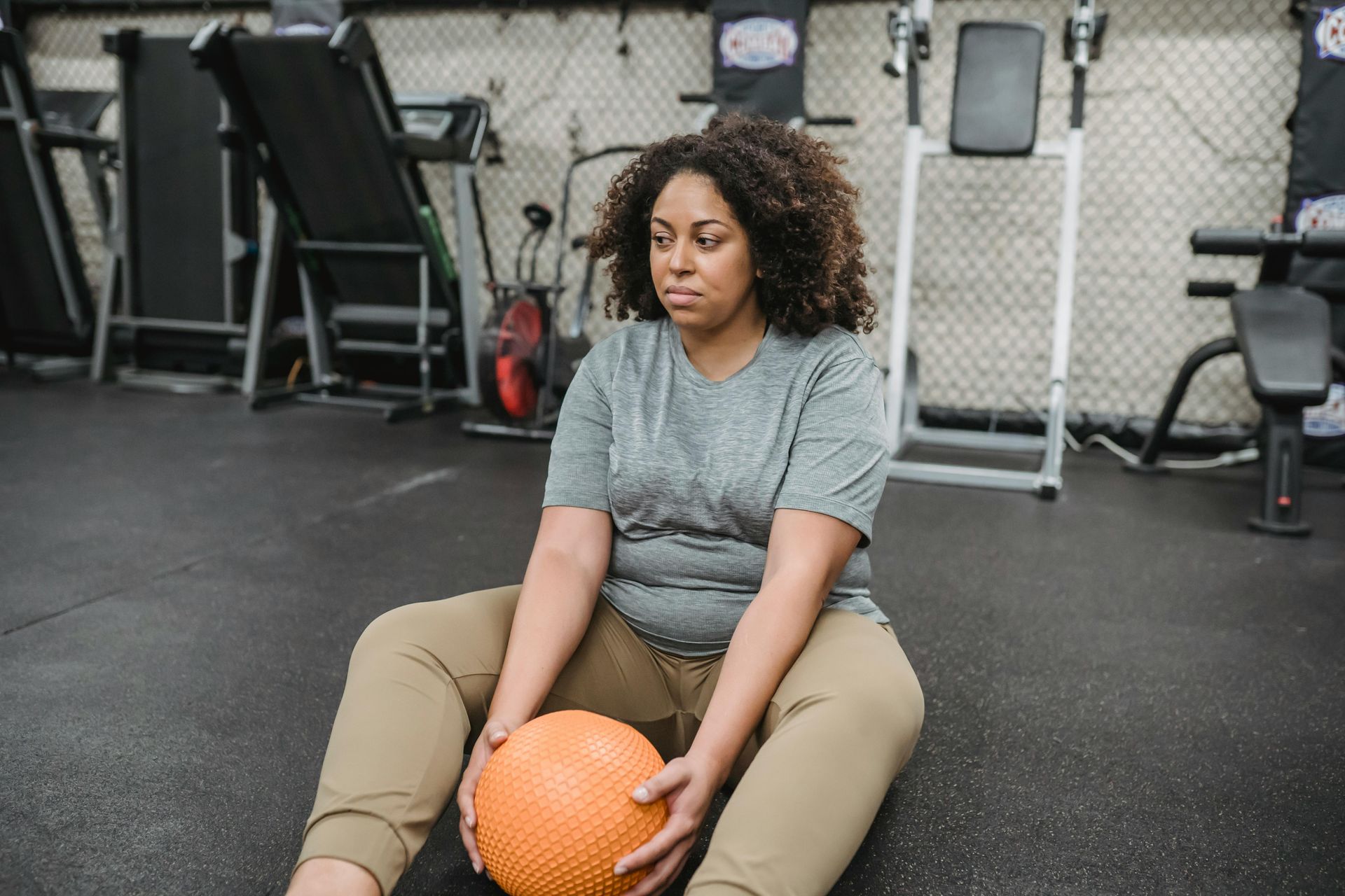 A woman relaxing during an exercise session