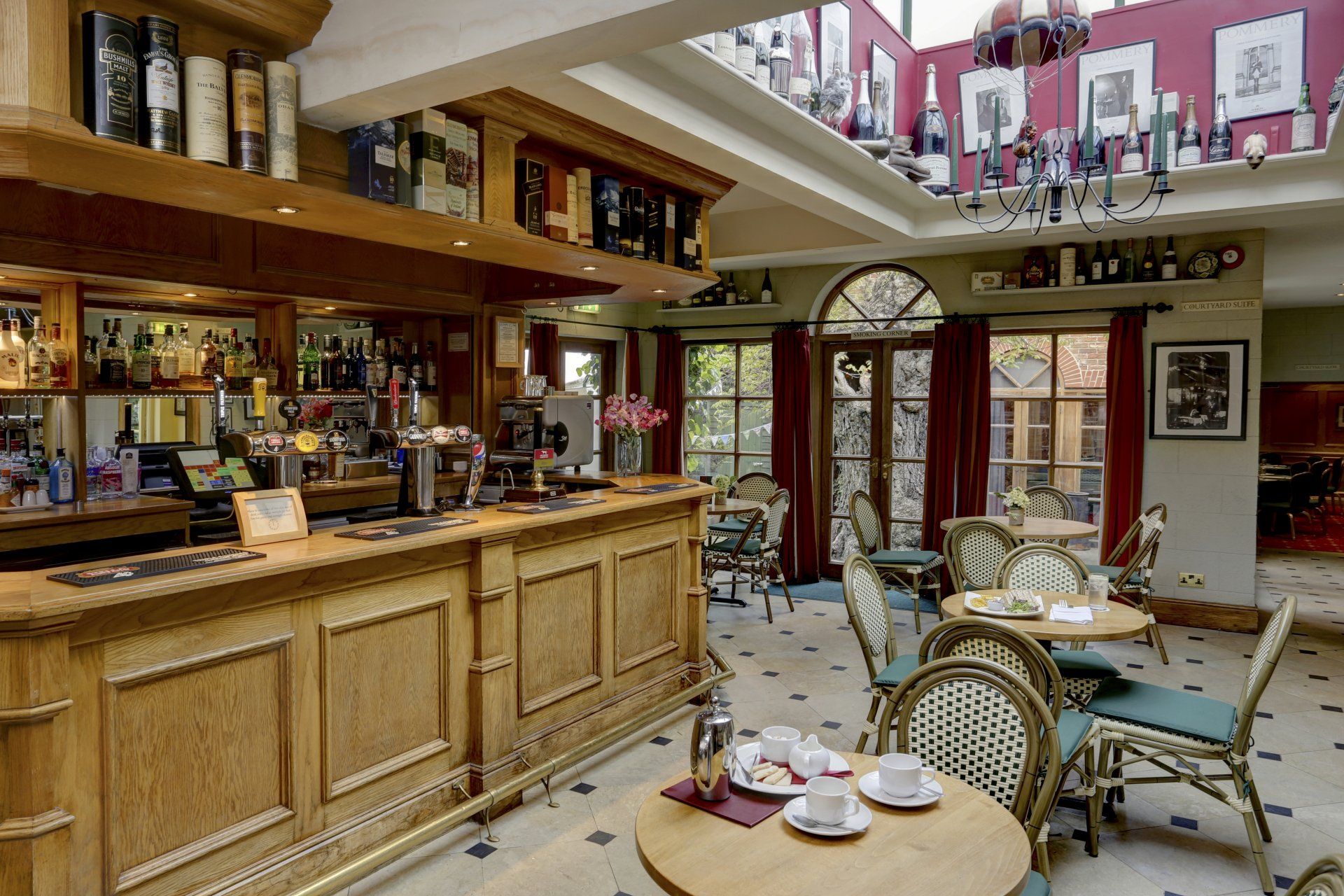 A restaurant with tables and chairs and a bar