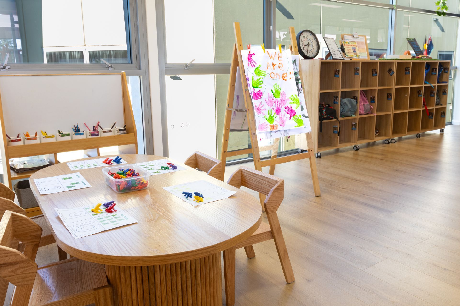There is a table and chairs in the room.