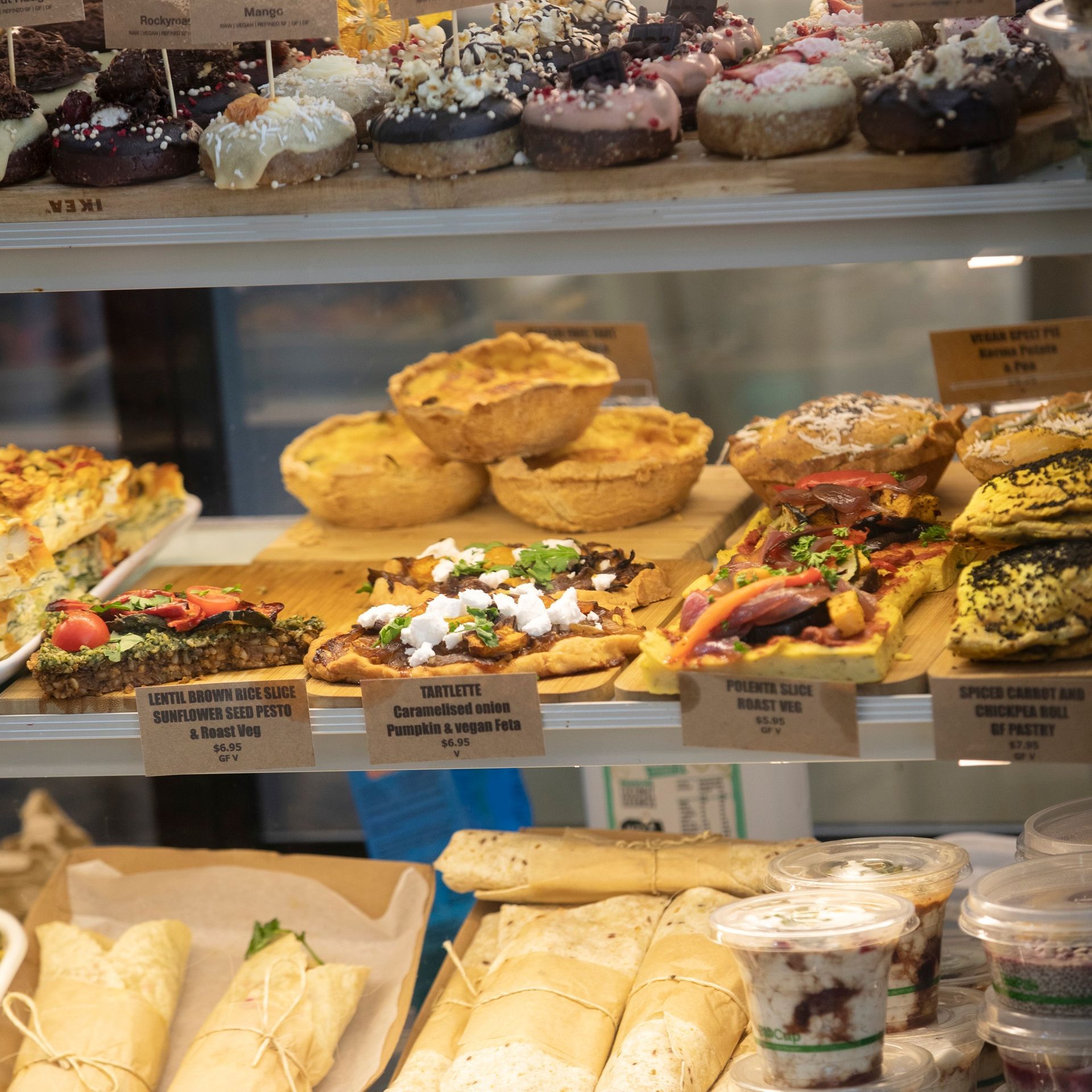 Display Case Filled With Pastries, Quiches, Sandwiches, and Wraps — The Real Grocer In Golden Beach, QLD