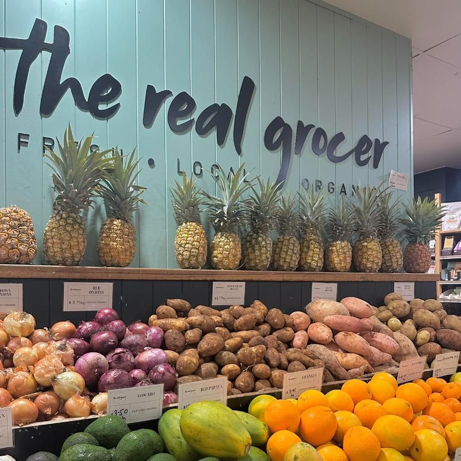 A Grocery Store With A Sign That Says The Real Grocer — The Real Grocer In Caloundra, QLD