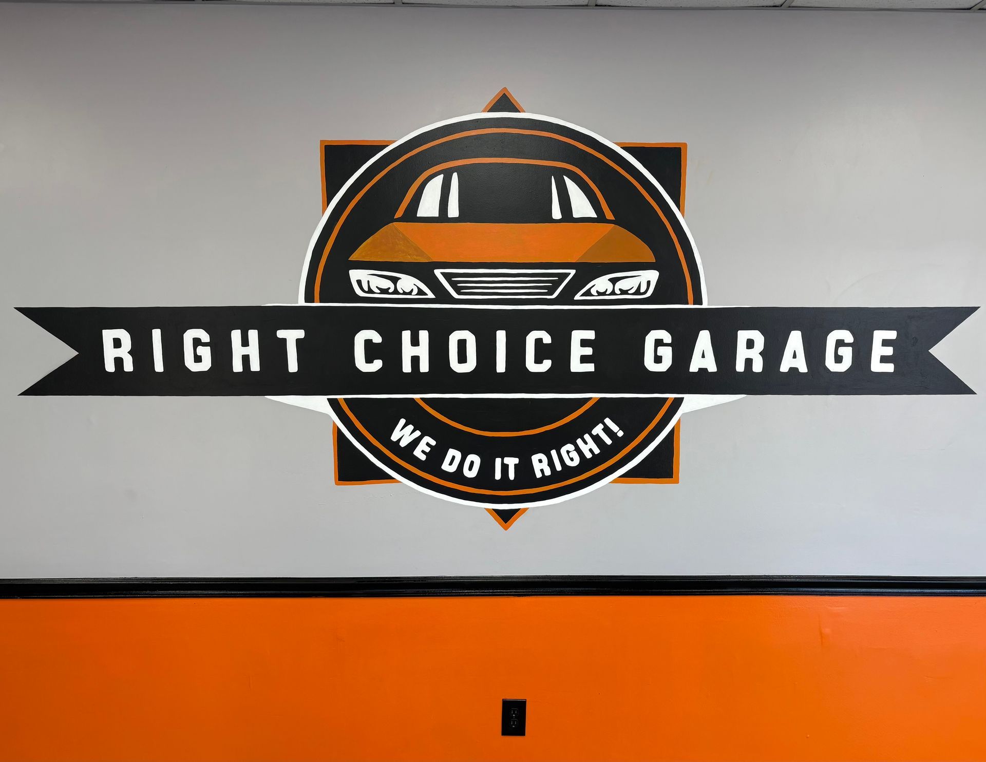 A business with cars parked out front under a blue sky, power lines overhead, and a sign for 