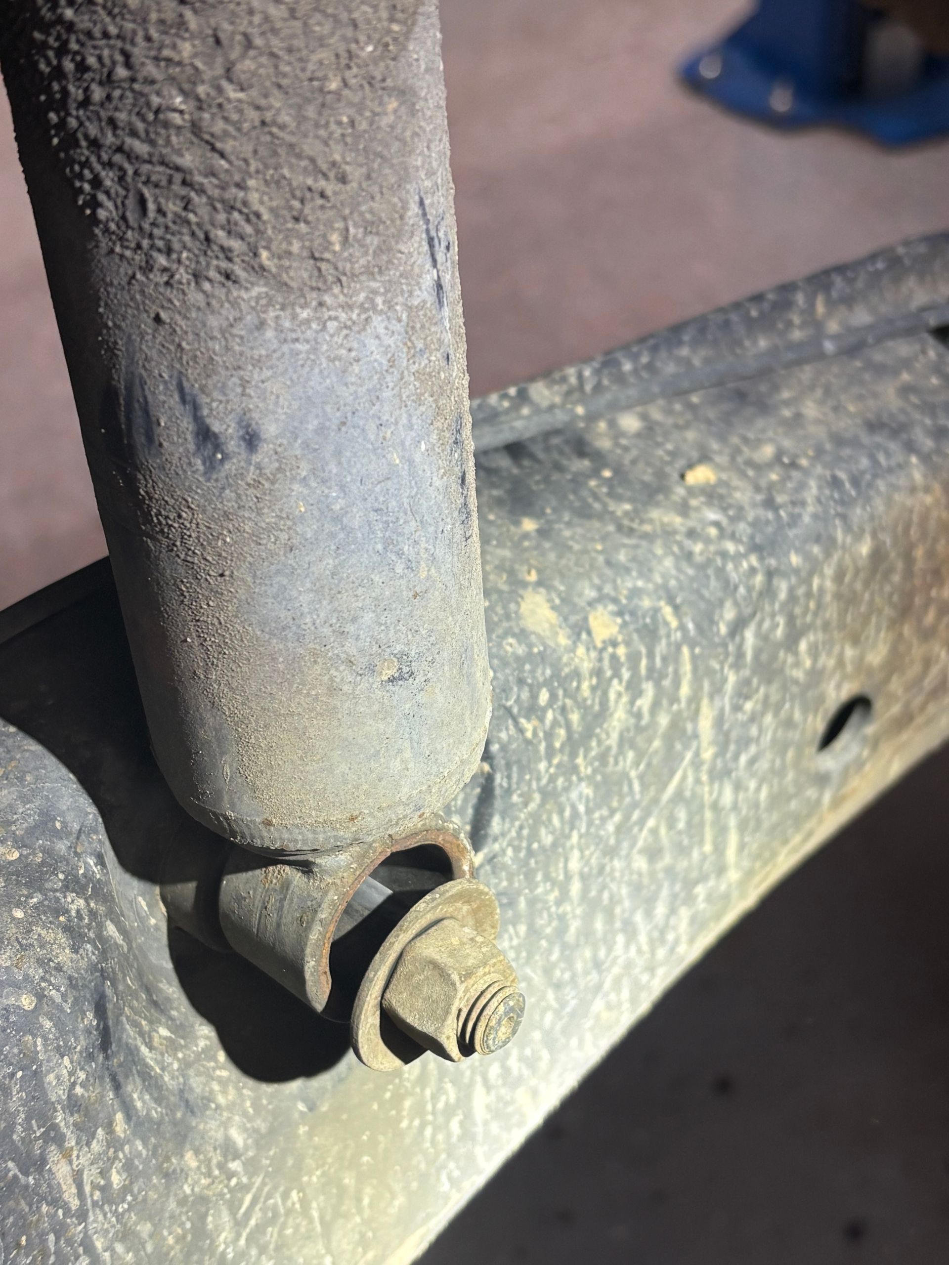 The image displays an open engine bay with a removed valve cover, which is a common sight during automotive maintenance or repair, such as a knock sensor harness replacement job.