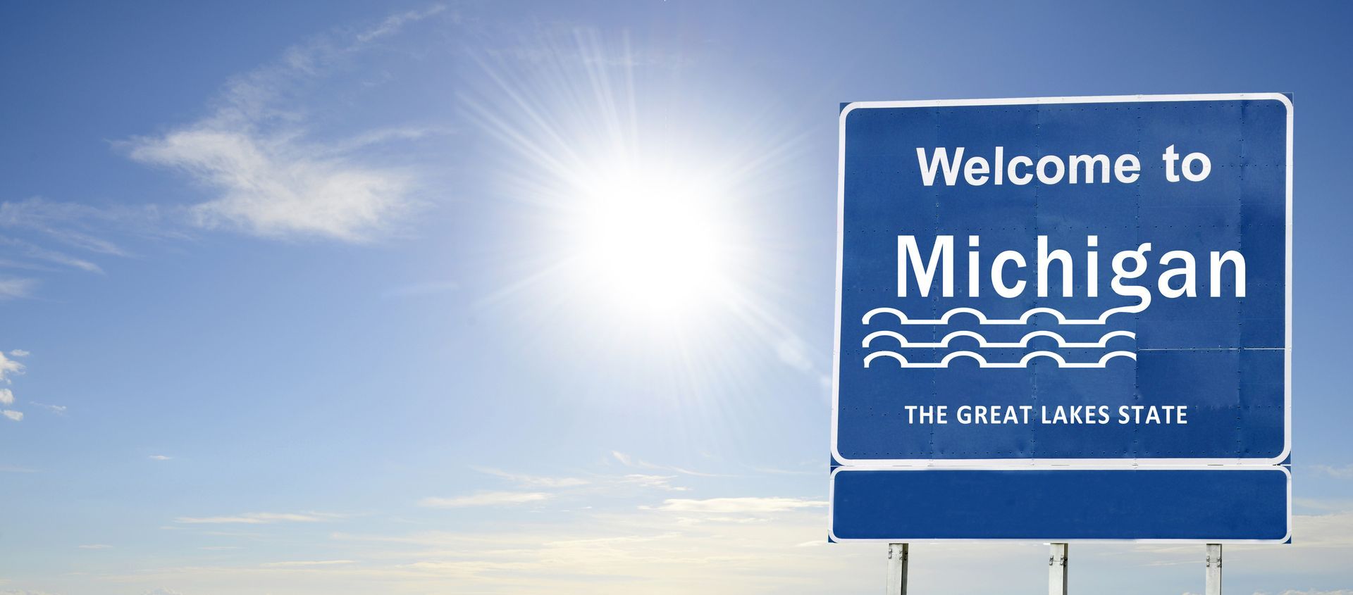Michigan state welcome road sign, showcasing quality exterior signs. Michigan state welcome road sign, showcasing quality exterior signs.