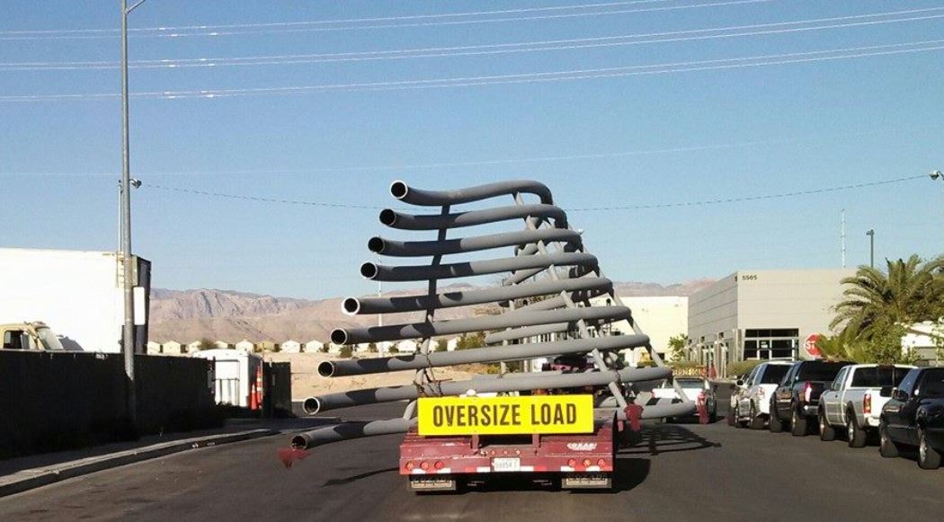 Sand and Gravel Hauling, — Truck Carrying Pipes in Las Vegas, NV