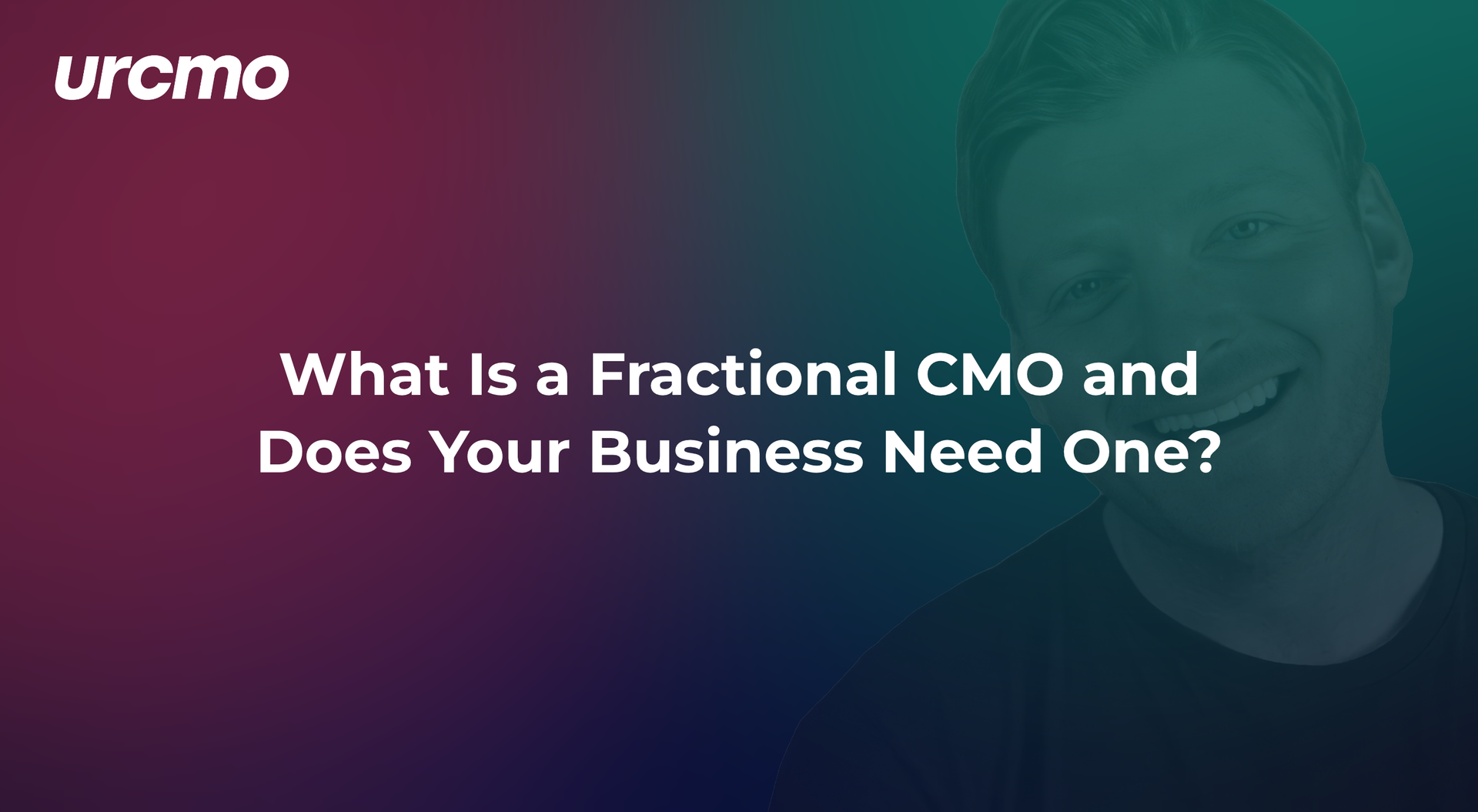 Smiling person in a dark setting, looking at the camera. Charlier McNeill Love