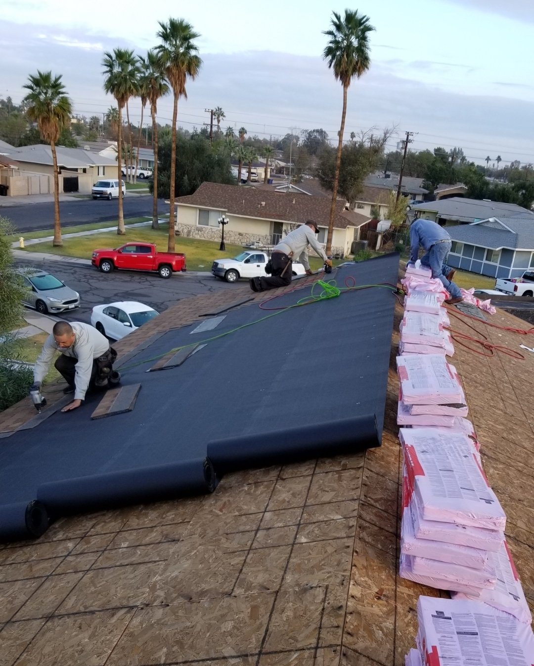 Barajas Roofing crew installing a new roof