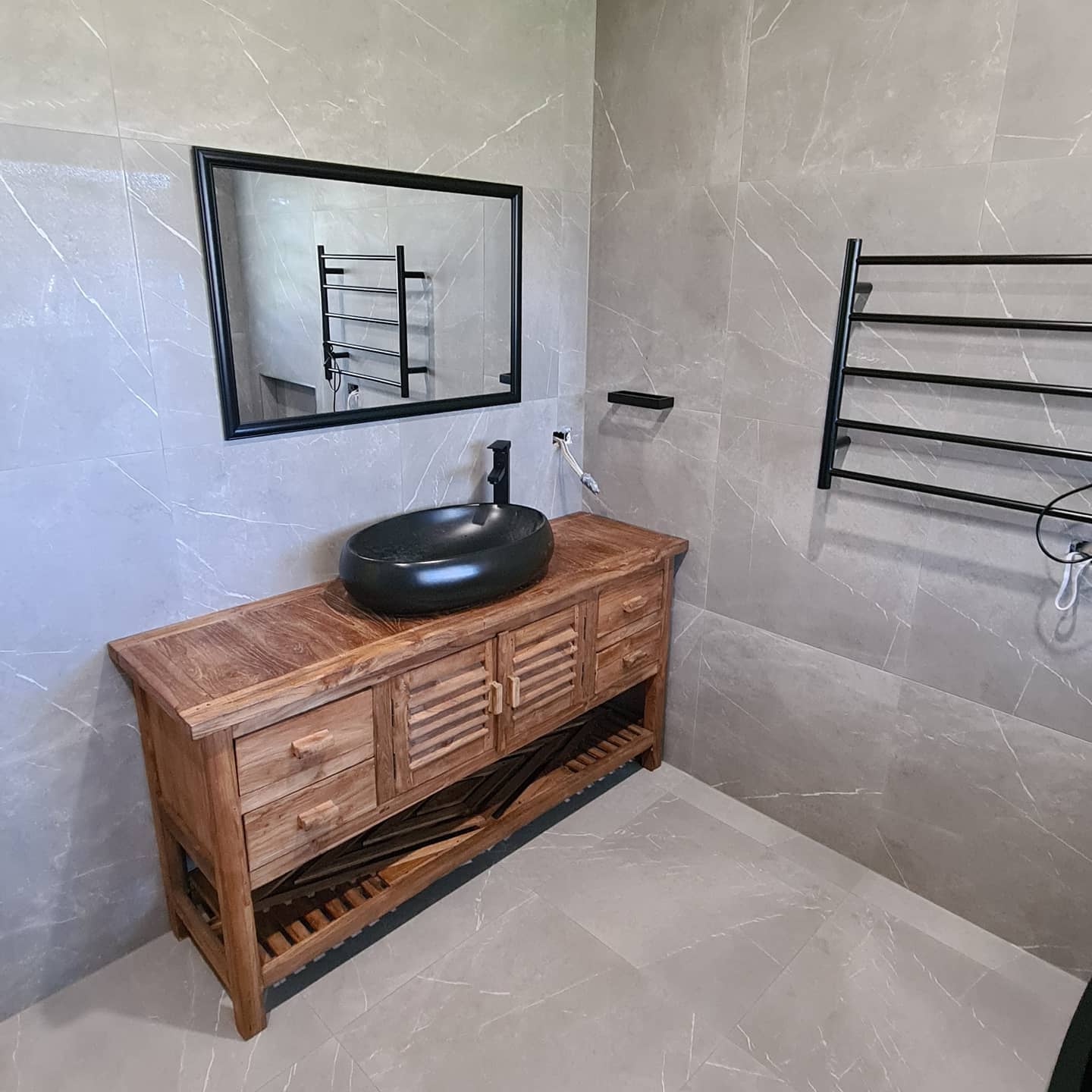 A Wooden Bathroom Sink Cabinet —  Bathroom Renovation in Medowie, NSW