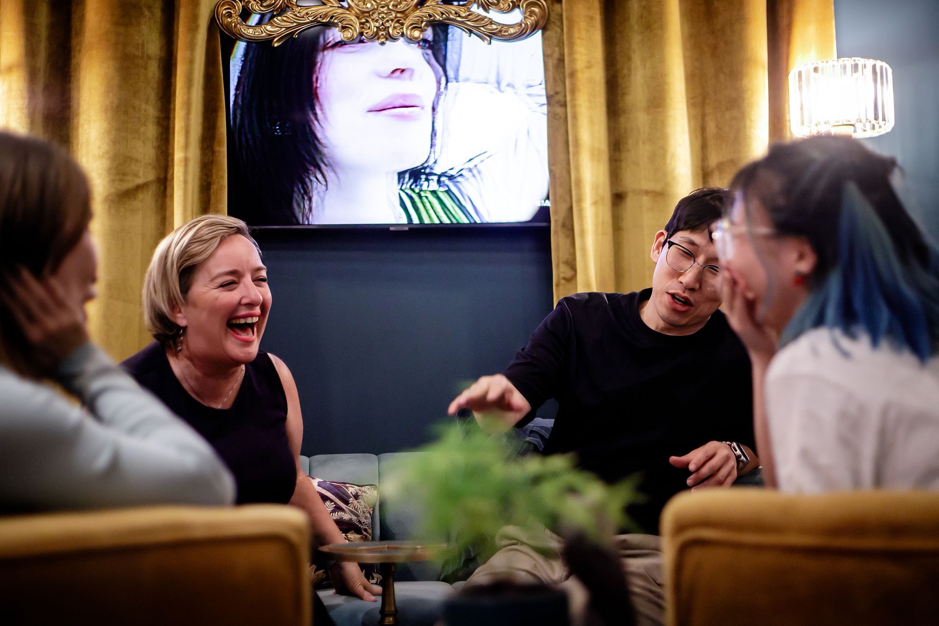 Friends having a laugh after a night out at Pitch Karaoke