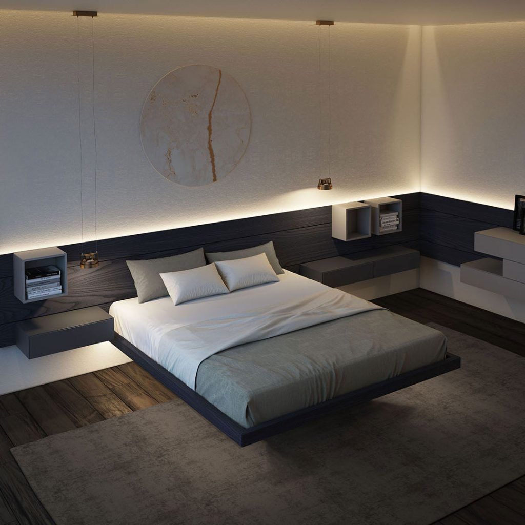 Una camera da letto con un letto e un orologio a parete