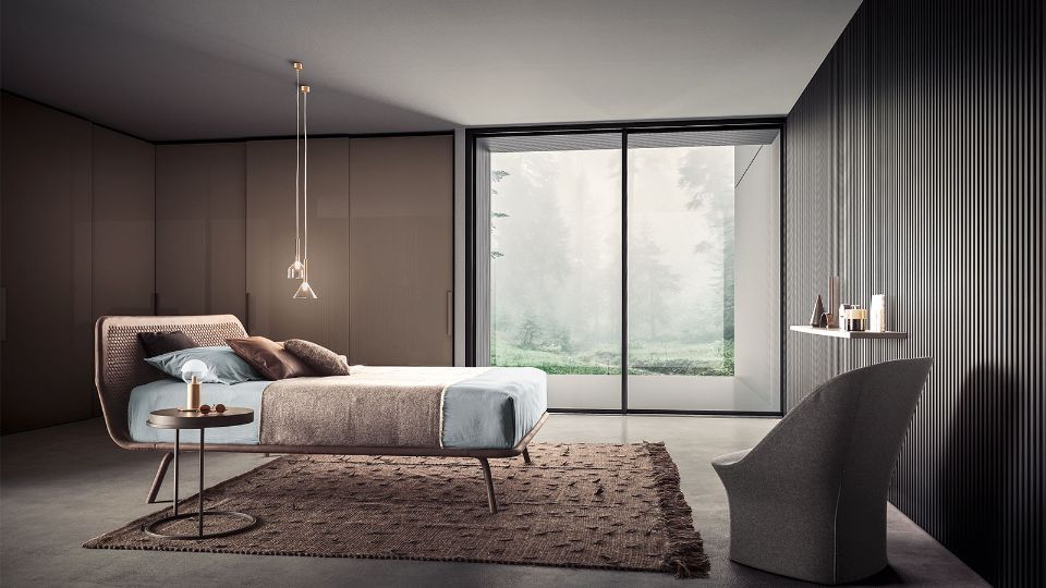 camera da letto con tappeto color rosa antico