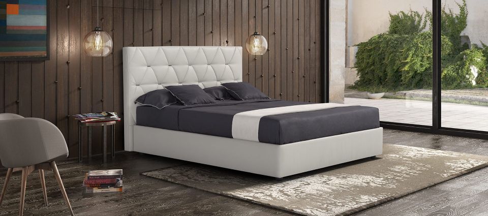 letto matrimoniale con struttura bianca imbottita