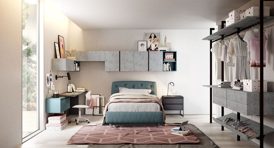 cameretta con tappeto rosa e letto a una piazza e mezzo