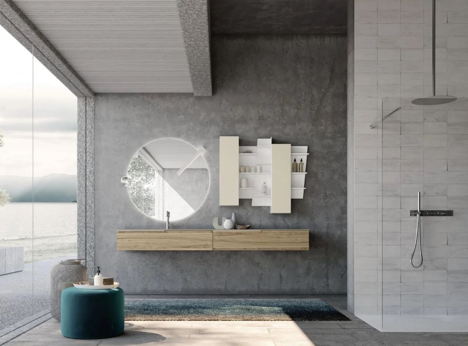 bagno in stile moderno con parete grigia e specchio tondo