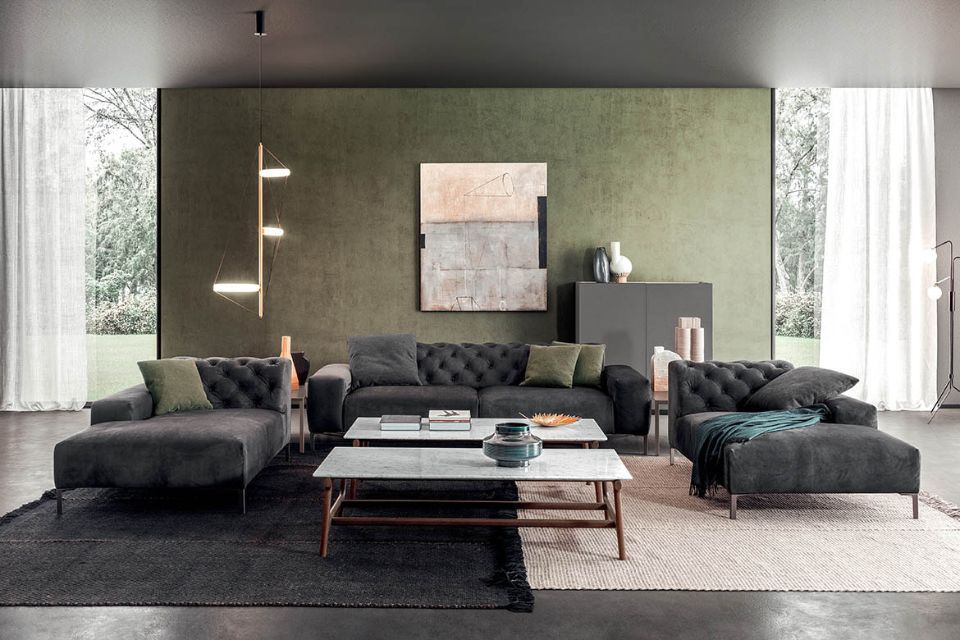 zona living con arredi verdi e grigi