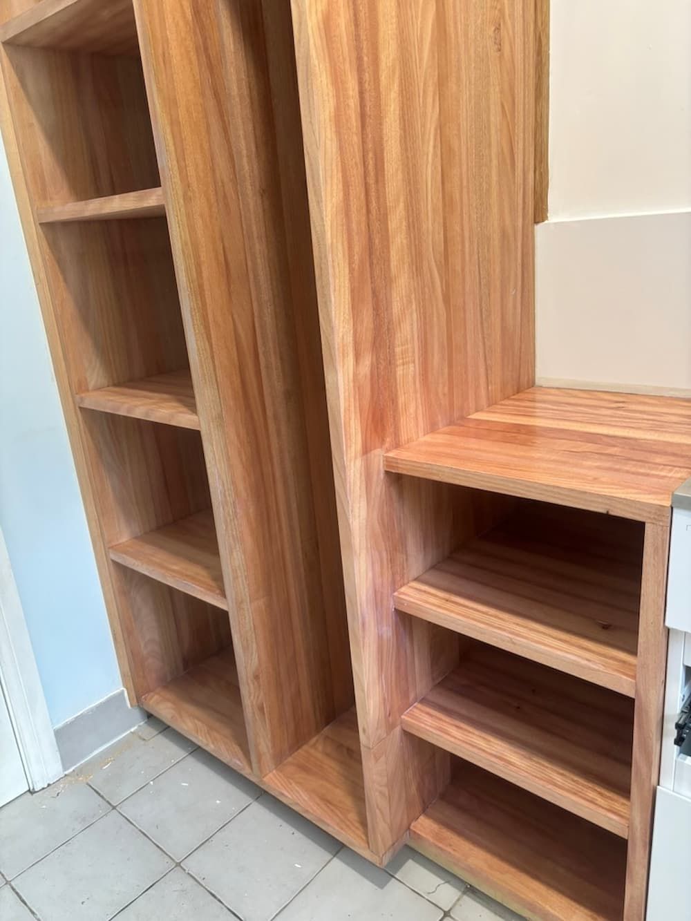 A Wooden Cabinet With Shelves And A Nightstand In A Room — Gary Eslick Home Improvements In Berkeley Vale, NSW