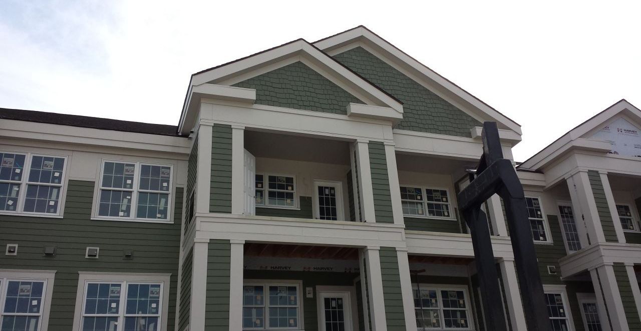 A large building with a lot of windows and columns