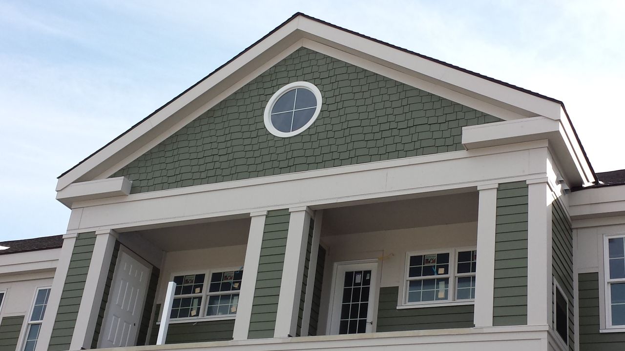 A building with a clock on the top of it
