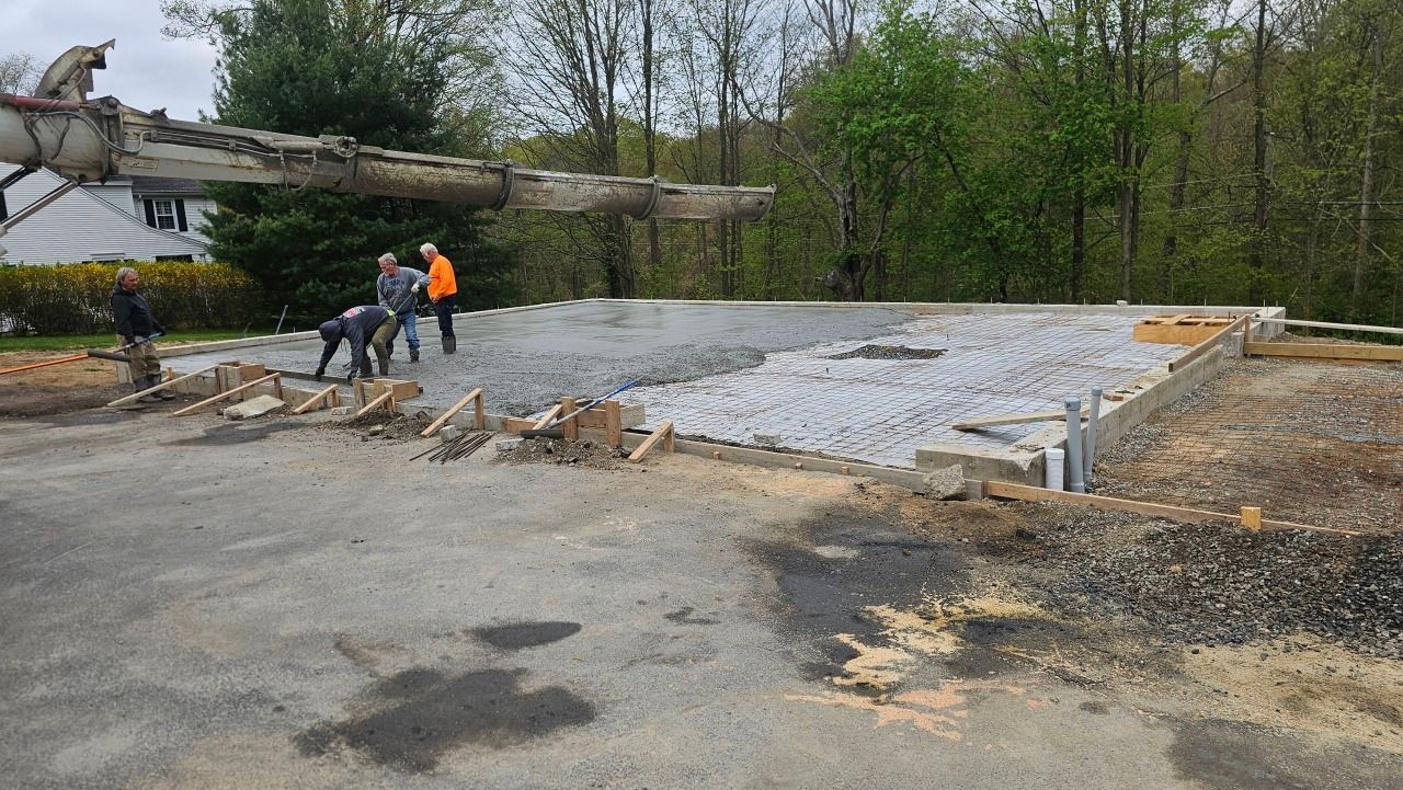 A group of people are working on a construction site.