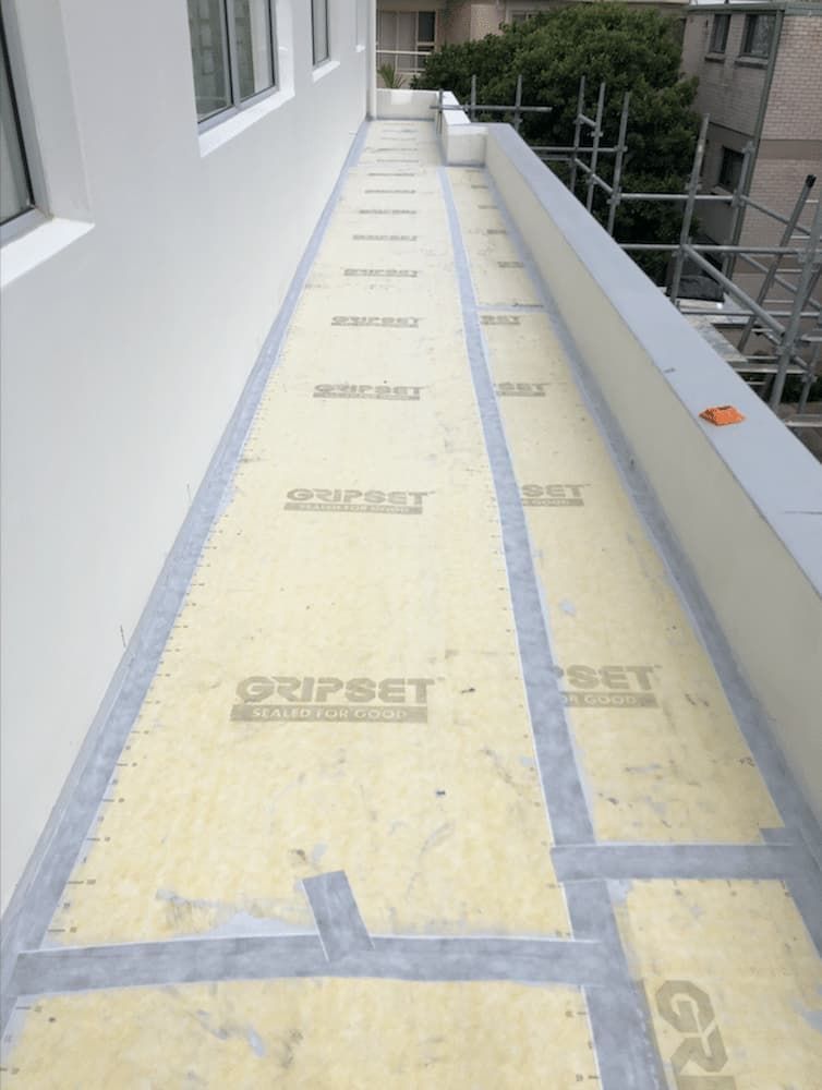 A Rooftop Showing a Waterproof Membrane — Consider It Sealed Waterproofing in Crangan Bay, NSW