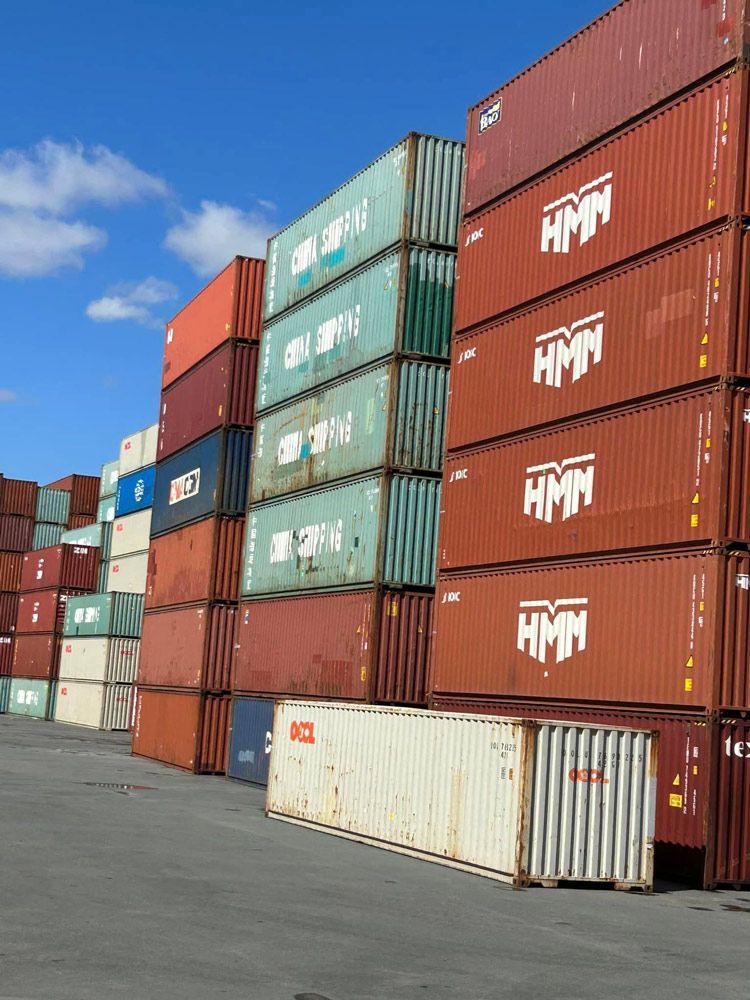 A Row of Shipping Containers — Ries Trucking in Gowrie Mountain, QLD