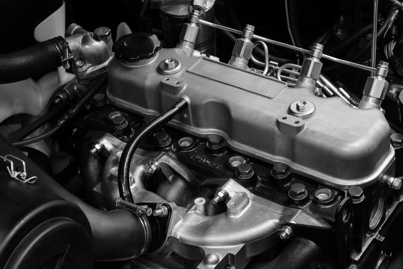 A black and white photo of a car engine