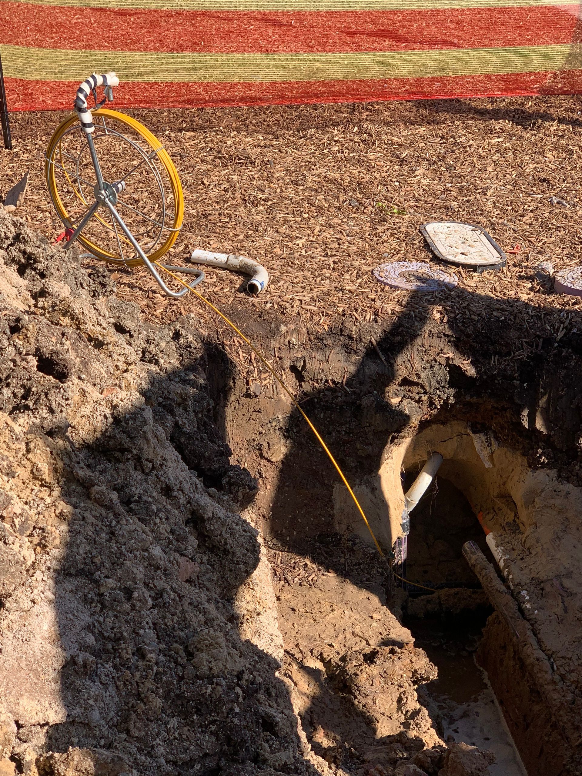 A person is digging a hole in the ground.
