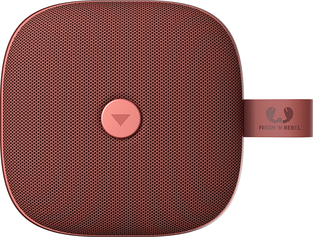 רמקול אדום קטן עם כפתור ורוד עליו.