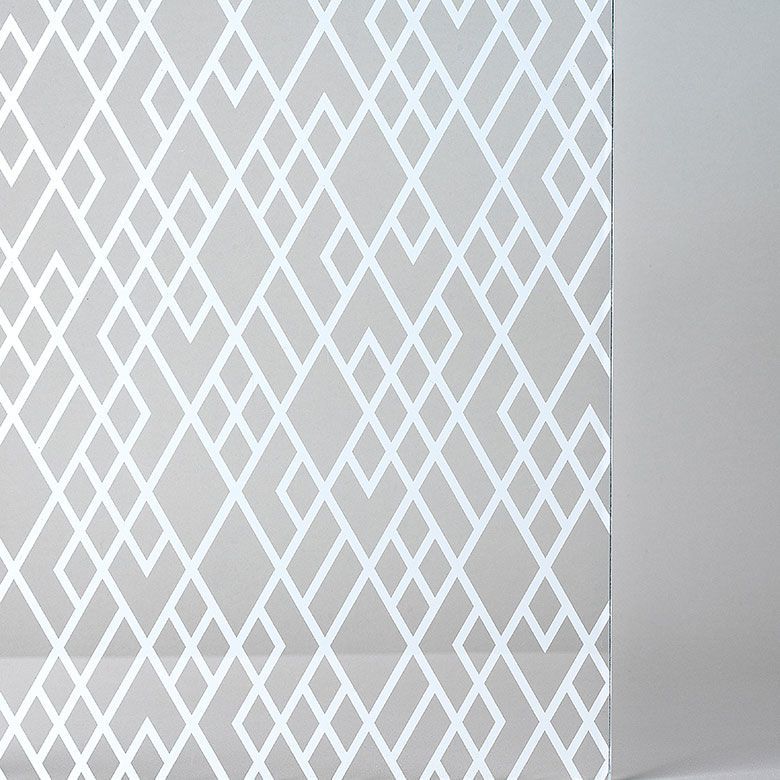 Gray patterned surface with white geometric diamond design.