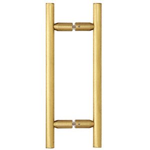 Gold door pull handle with cylindrical bars and central mounting hardware.