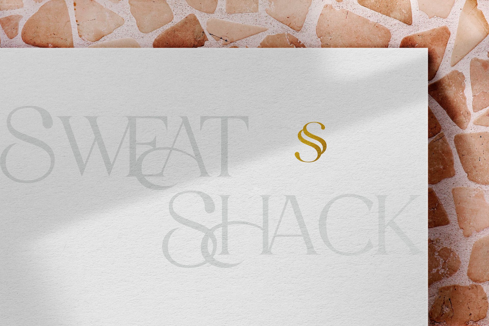 A white piece of paper with the words sweat shack written on it.