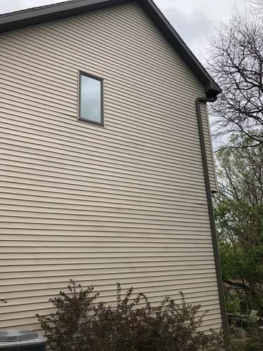 Cleaned up two story home after mildew removal from soft washing
