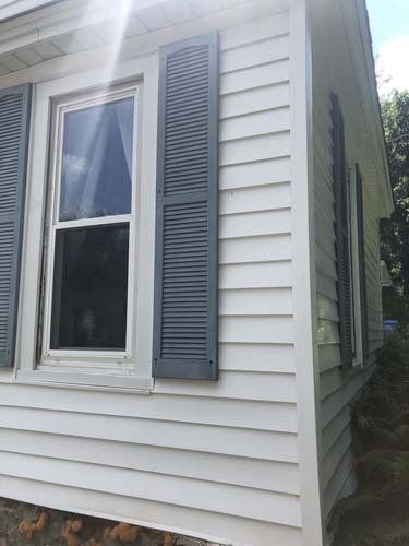 Cleaned off, pressure washing summer room