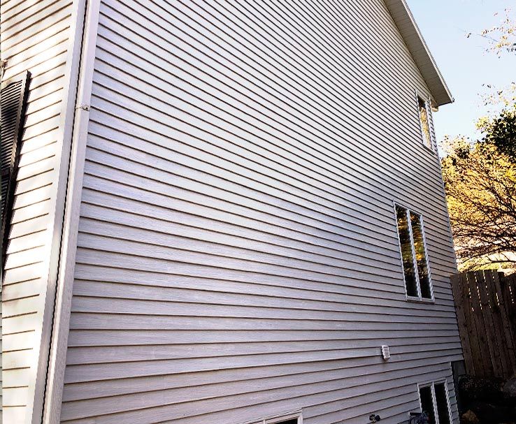Pressure Washed Siding of Madison Home Before and After